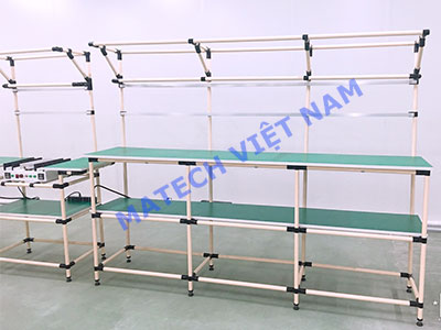 ban thao tac ong thep boc nhua mat go