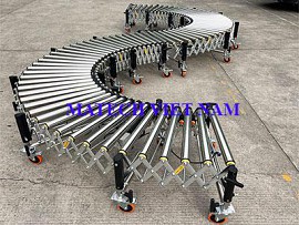 Băng tải con lăn xếp inox dài 15 mét