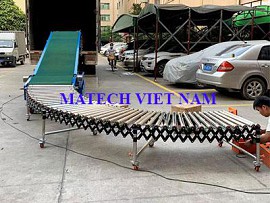 Băng tải con lăn xếp ghép cùng băng tải PVC chuyển hàng từ container