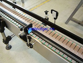 Băng tải xích thẳng bản lề nhựa khung inox