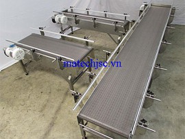 Băng tải xích tấm inox có thành chắn